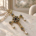 Collana Castel con croce e perle