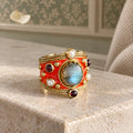Anello Alhambra con smalto Arancio e Labradorite