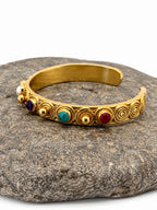 Tresor — bracciale rigido in ottone e pietre semipreziose