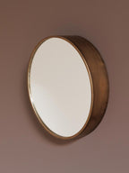 Specchio tondo con profilo in rame
