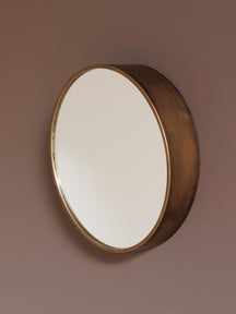 Specchio tondo con profilo in rame